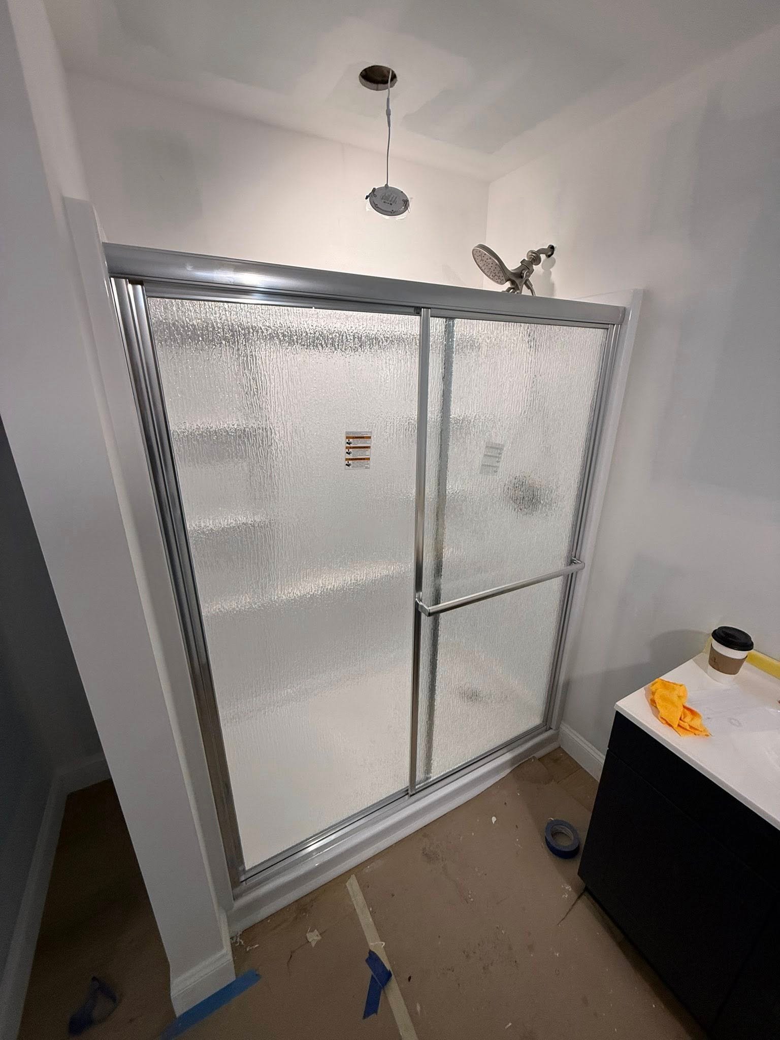 Bathroom shower renovation with new tile surround