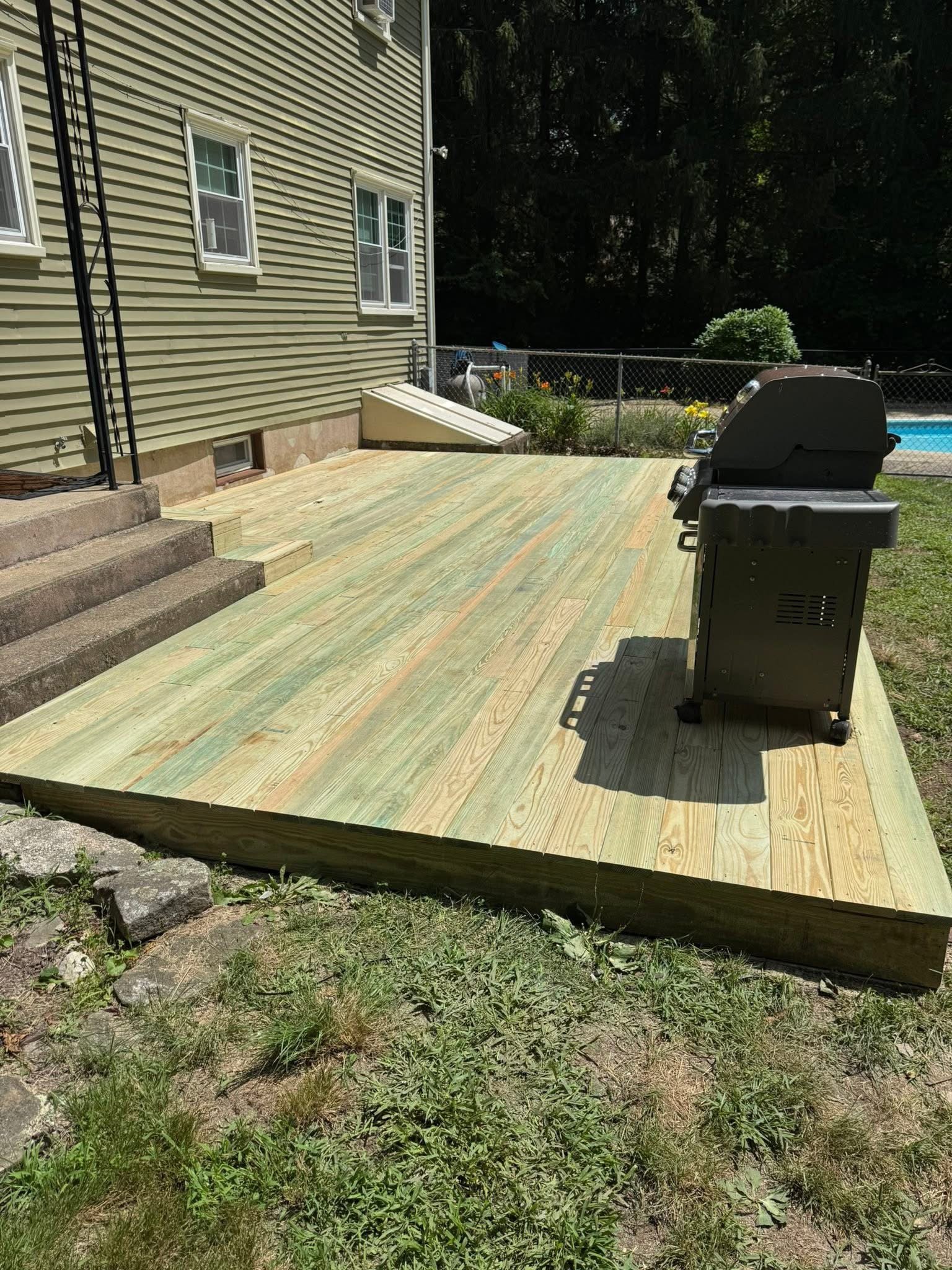 Custom deck construction with railing