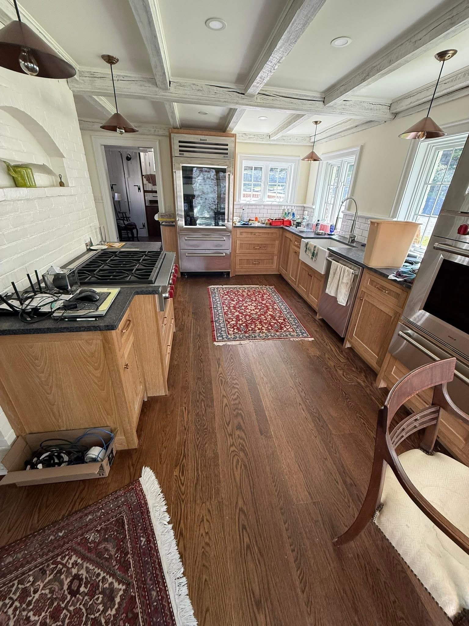 New flooring installed throughout a remodeled kitchen