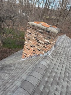 Completed roof section with new shingles