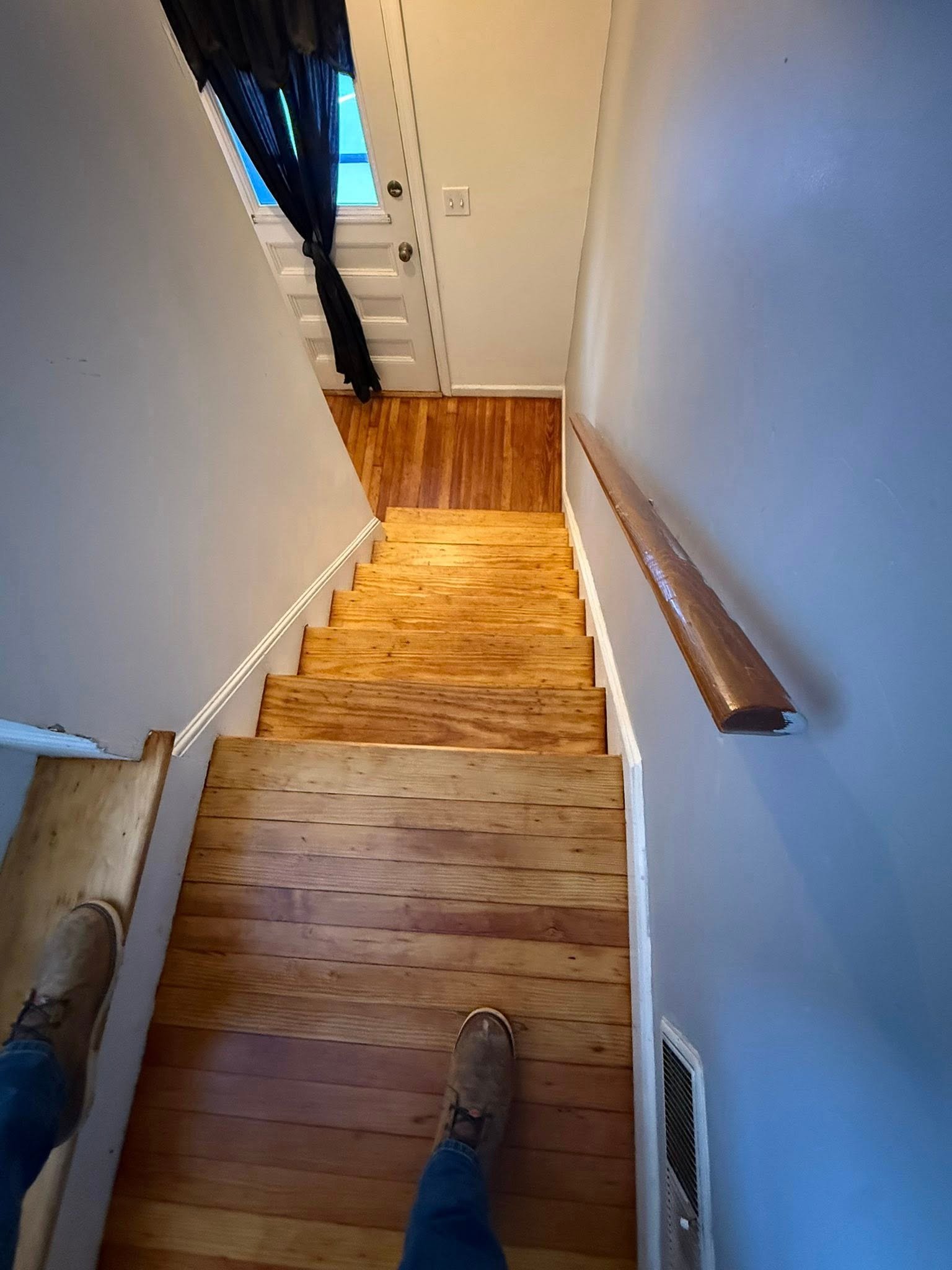 Refinished staircase with new stain